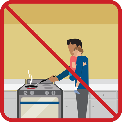 Never hold a child while you are cooking or carrying hot liquids.